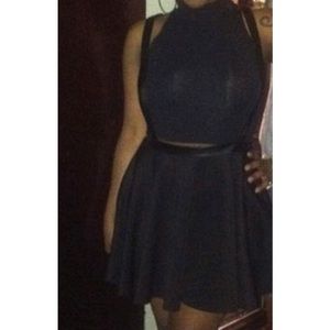 Black skirt with suspenders. Size Medium